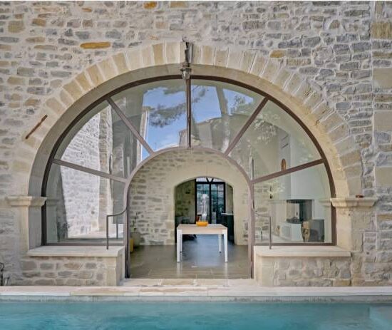 Verrière cintrée sur une façade en pierre 3 - Verrière - site CMT Métallurgie