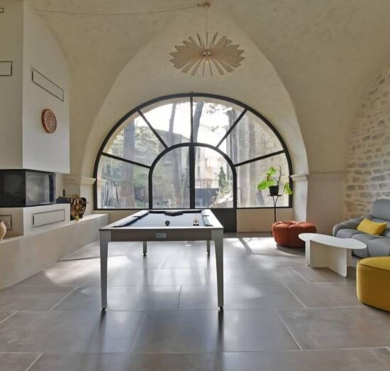 Verrière cintrée sur une façade en pierre 4 - Verrière - site CMT Métallurgie