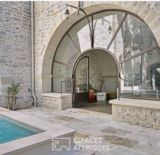 Verrière cintrée sur une façade en pierre 5 - Verrière - site CMT Métallurgie